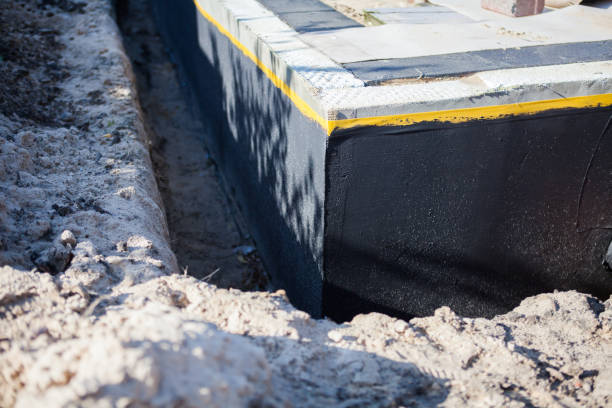 Professional Waterproofing technician working in Bluffton, OH